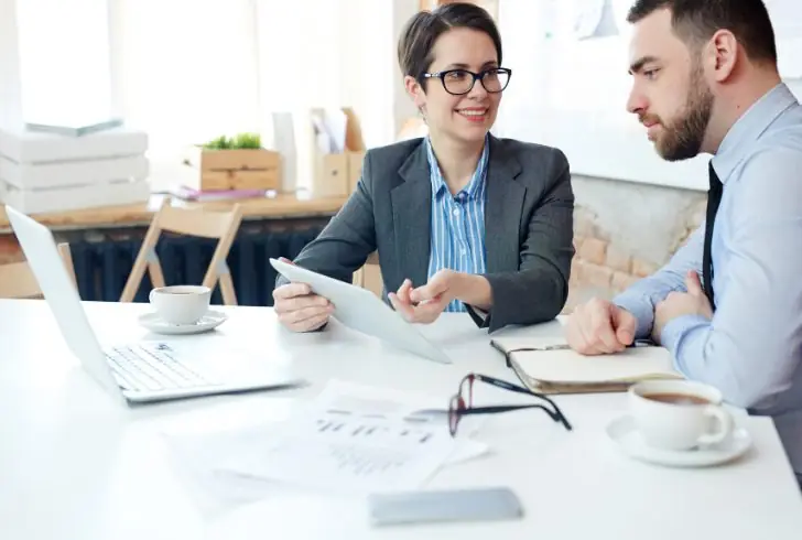 Person planning finances with advisor
