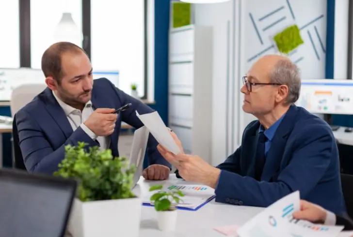 Financial advisor helping with debt plan